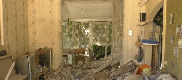 Donetsk Shelling Aftermath: Burnt Furniture and Ruined Walls Donetsk Shelling Aftermath: Burnt Furniture and Ruined Walls - Sputnik International