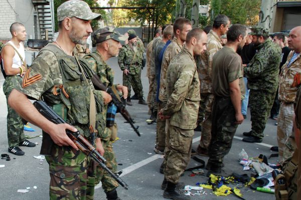 About 20 captives have been returned to Kiev after a ceasefire was imposed in eastern Ukraine but Kiev hopes that the process of prisoner exchange will take on a more large-scaled implementation, a spokesman for the Ukrainian National Security Council said Monday. - Sputnik International