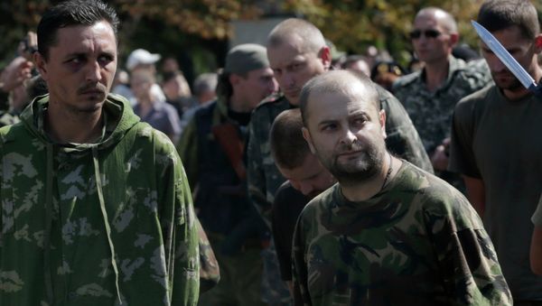 The Kiev government and the self-proclaimed people’s republics of Donetsk and Luhansk agreed on a prisoner exchange scheme under which a total of 375 people will be swapped, the Luhansk leader said Thursday. The Kiev government and the self-proclaimed people’s republics of Donetsk and Luhansk agreed on a prisoner exchange scheme under which a total of 375 people will be swapped, the Luhansk leader said Thursday. - Sputnik International
