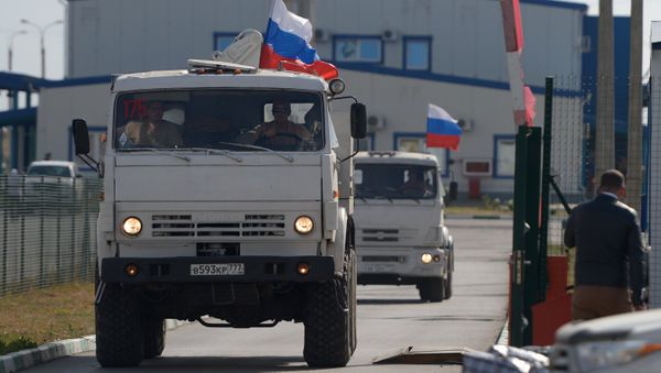 The Russian customs agency on the border with Ukraine on Saturday denied allegations of having prevented Ukrainian border guards from inspecting the convoy of 220 trucks carrying a second batch of humanitarian aid to the stricken regions in eastern Ukraine. - Sputnik International