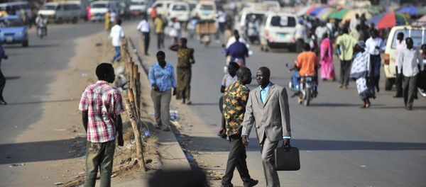 People walk on a street in Juba, southern Sudan, Jan. 8, 2011. Around four million southern Sudanese are expected to vote in the coming referendum on Sunday to decide whether the region should remain united with the north or secede to establish an independent state. People walk on a street in Juba, southern Sudan, Jan. 8, 2011. Around four million southern Sudanese are expected to vote in the coming referendum on Sunday to decide whether the region should remain united with the north or secede to establish an independent state. - Sputnik International