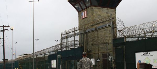 Four Guantanamo detainees from Afghanistan, held in the notorious US prison for about a decade, were released and sent home, according to Washington Post. - Sputnik International