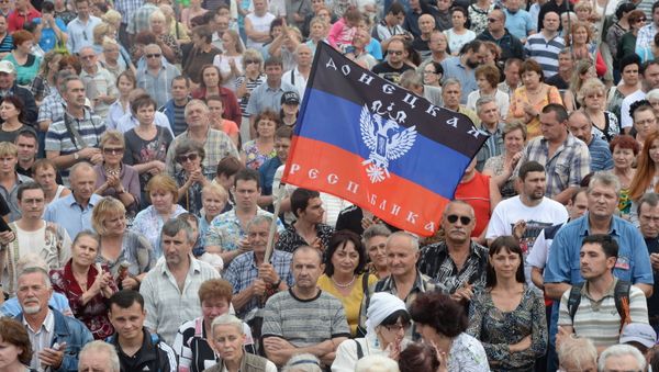 Local residents participate in a meeting in support of the self-proclaimed Donetsk People's Republic. Local residents participate in a meeting in support of the self-proclaimed Donetsk People's Republic. - Sputnik International