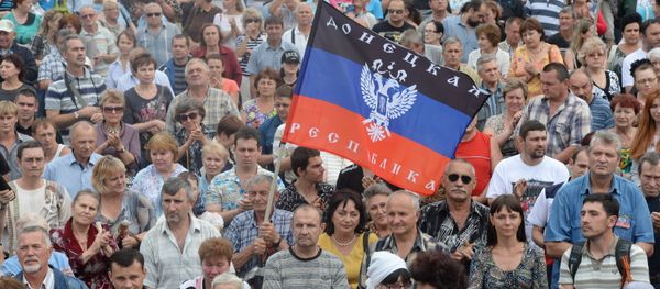 Local residents participate in a meeting in support of the self-proclaimed Donetsk People's Republic. Local residents participate in a meeting in support of the self-proclaimed Donetsk People's Republic. - Sputnik International