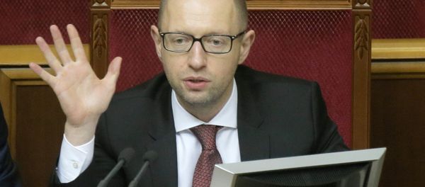 Ukrainian Prime Minister Arseniy Yatsenyuk speaks to lawmakers during the parliament session in Kiev, Ukraine, Tuesday, Oct. 7, 2014. Ukrainian Prime Minister Arseniy Yatsenyuk speaks to lawmakers during the parliament session in Kiev, Ukraine, Tuesday, Oct. 7, 2014. - Sputnik International